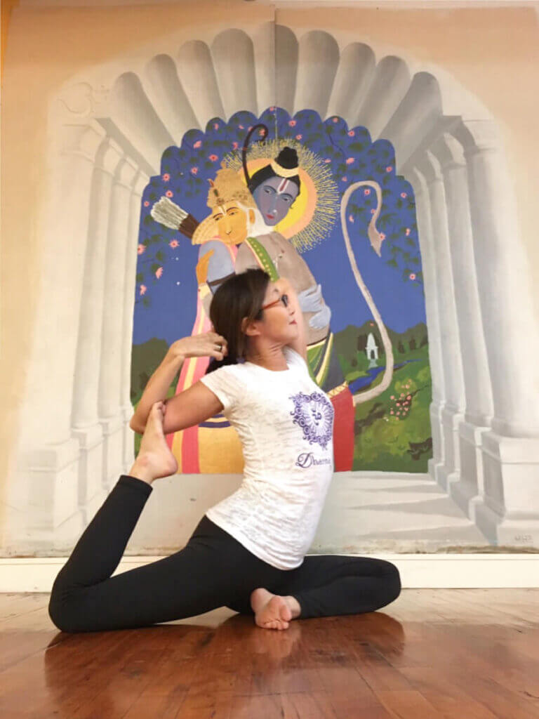 Mika practising asana in Dharma Yoga center in NYC.