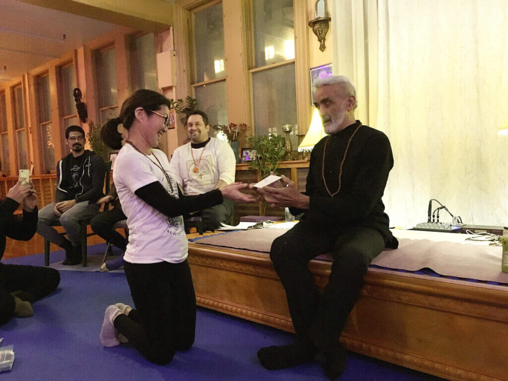 Mika receiving a Certificate from Sri Dharma