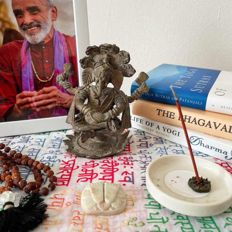 yoga text books, Sri Dharma's picture on a table.